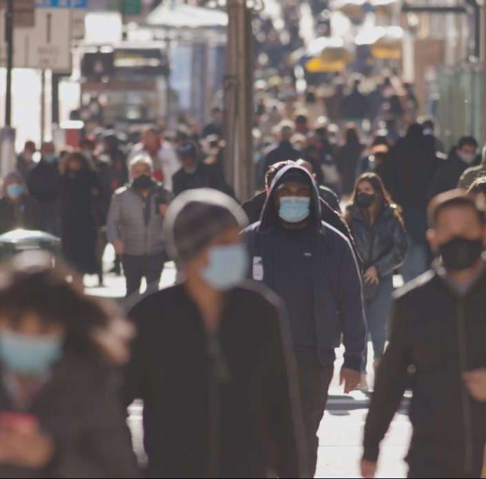 Crowd Of People Walking Street Wearing Masks