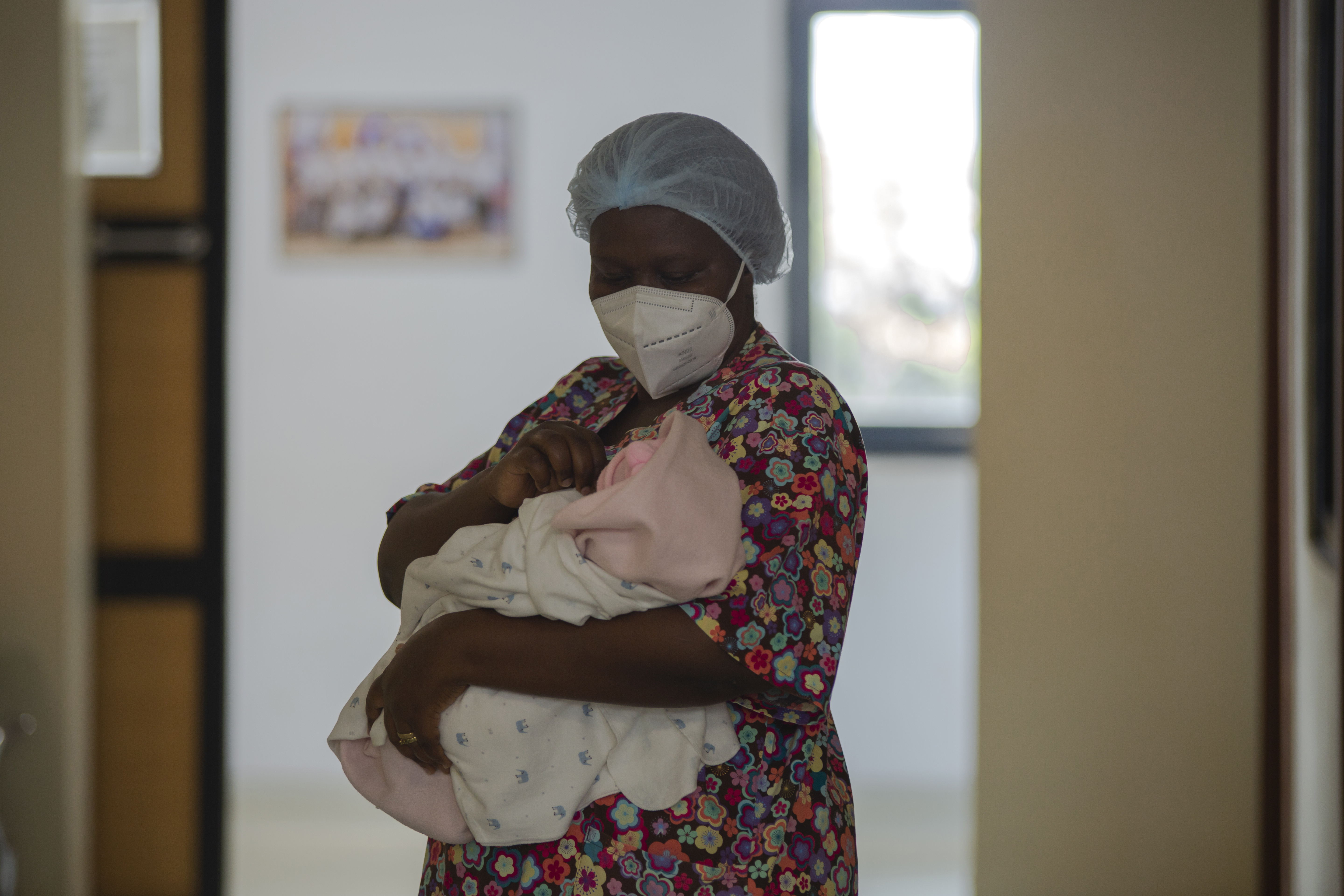 Judith Cradles Newborn Child