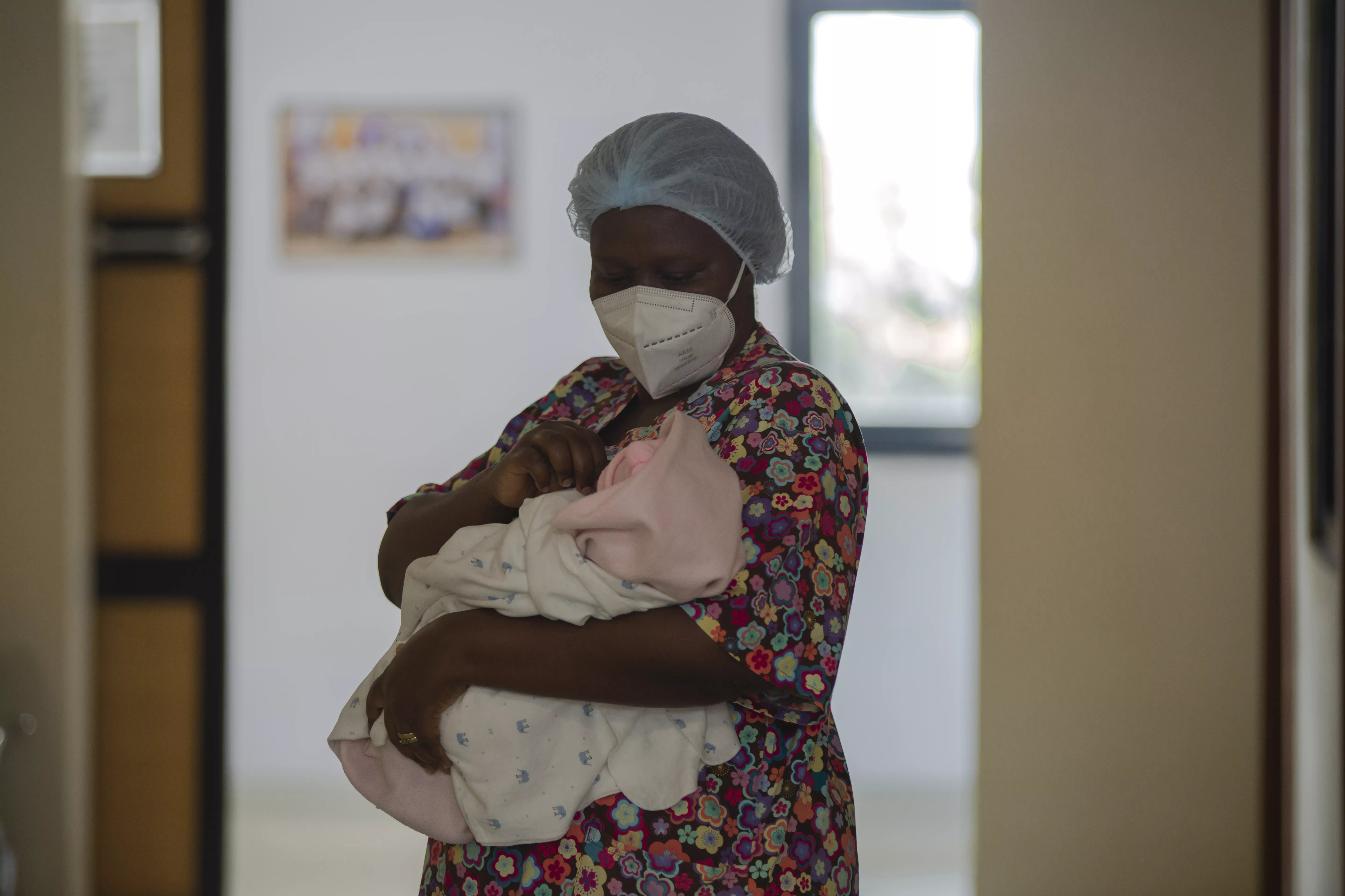 Judith Cradles Newborn Child